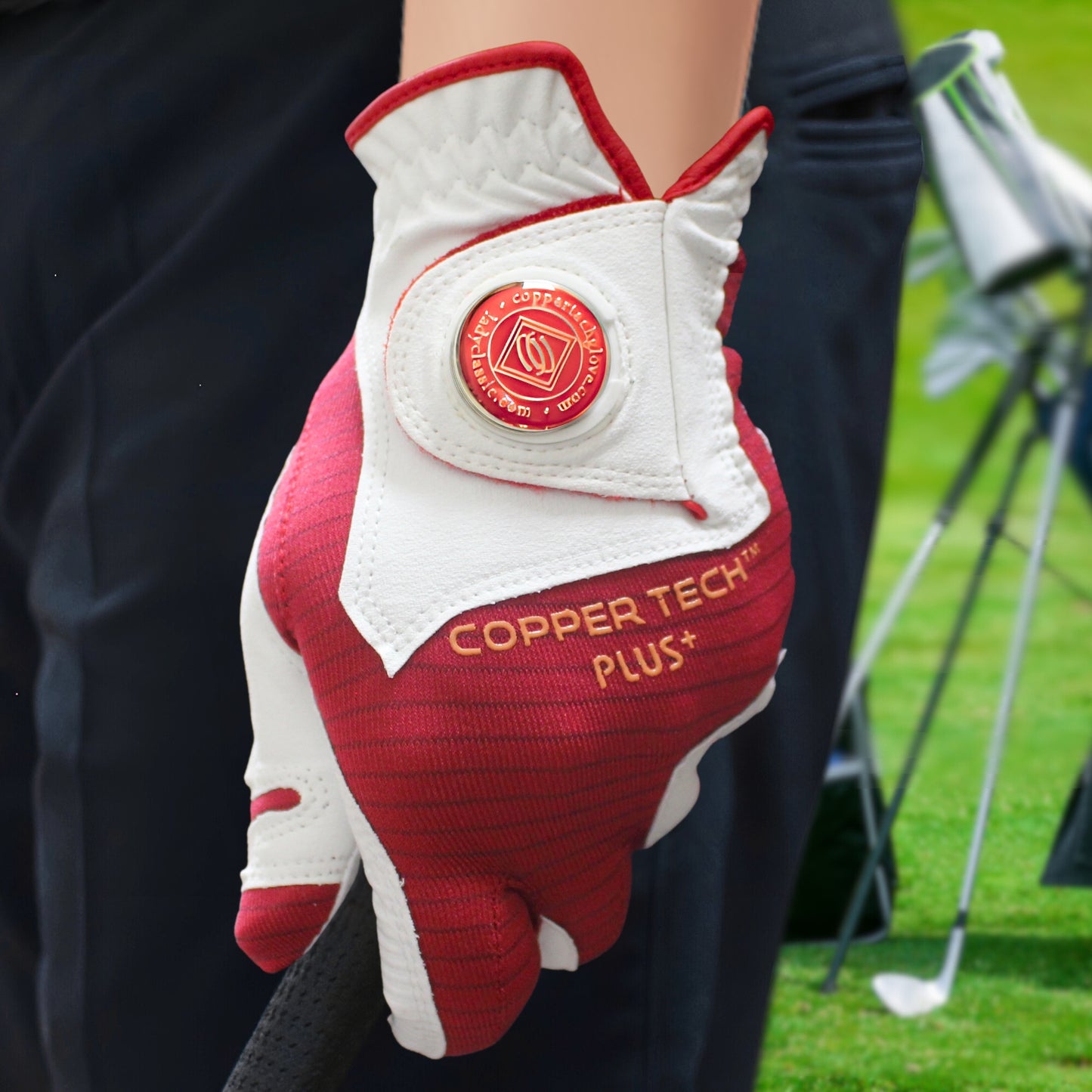 Red Flexible golf glove for women with copper technology, which helps golfers with arthritis to reduces hand pain and promotes blood flow with mild compression; offered in left and right-hand options.